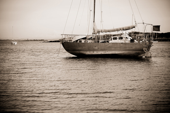 Blue water boat in Sepia